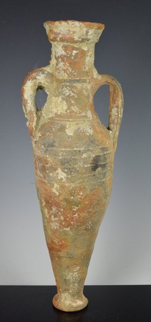 ANCIENT ROMAN EARTHENWARE SHIPWRECK AMPHORA: A tapered base ceramic Roman (200 BC - 300 AD) ships transport amphora. A slender terracotta vessel with twin handles, pointed base, original oceanic animal crusctacians inside and out, still intact.