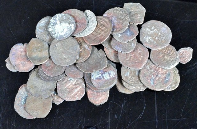 Group of 42 Byzantine coins: Approx 1" diameter with various images, most with Christ. 4th - 6th Century. Provenance: Ex- John Hibner, acquired in Turkey during military service 1960's