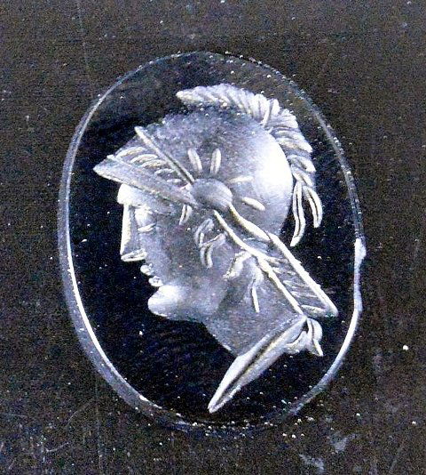 Ancient Roman intaglio of Roman soldier: Rome, ca. 1st century CE. Ancient Ancient Roman intaglio of Roman soldier. Size: 1.9 cm.long, decorated with what looks like military soldier. Provenance: Ex- John Hibner, acquired in Turkey during mi