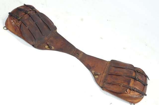 Early US Cavalry saddle bags: Early US Cavalry saddle bags, nice patina to leather and market with US stamps. Brass attachments, rings and rivets.