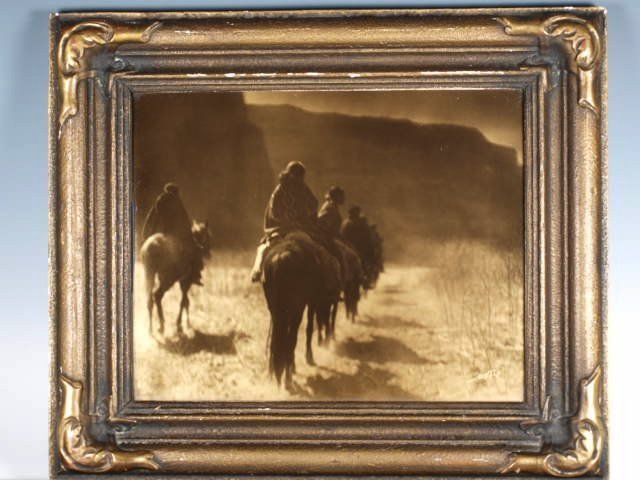 Edward S. Curtis Goldtone Vanishing Race: Edward Sheriff Curtis Orotone Vanishing Race Signed Curtis l.r. and copyright l.l.; in original arts and crafts bronzed gesso and wood batwing frame; with Curtis's descriptive label attached to verso,