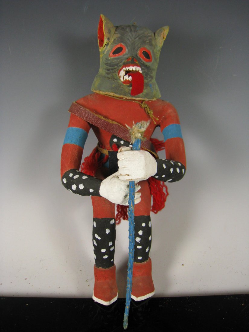 Hopi "Wolf" Kachina / Katsina, 1970's: Hopi "Wolf" Kachina / Katsina, 1970's. Carved from cottonwood root, and adorned with commercial fur strips, leather, fabric and felt. This doll was intended to be hung and doesn't stand on it's own, a