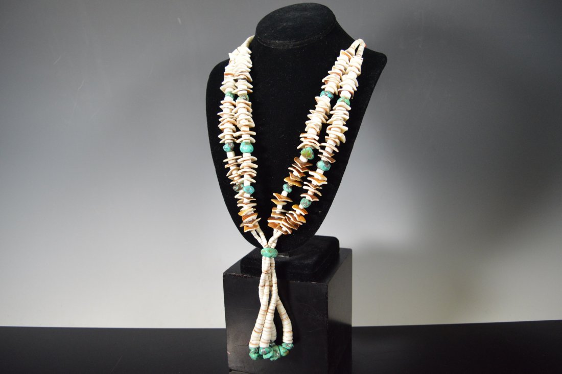 Santo Domingo Nugget Necklace - Turquoise and Shell: Nugget necklace, jacla style, Santo Domingo Pueblo. 15 turquoise nuggets with shell spacers and graduated heishe and discoidal beads. FROM THE ESTATE OF JOHN KOEHLER. Mr. Koehler, an avid collector, h