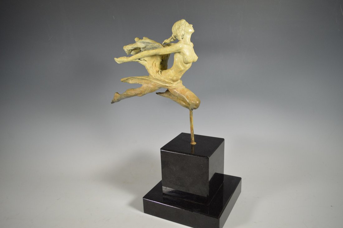 TUAN NGUYEN (VIETNAMESE 20TH CENTURY), BRONZE: TUAN NGUYEN (VIETNAMESE 20TH CENTURY), "Zephyr" 1999 BRONZE, SIGNED #91/250 On statue. HEIGHT 16" as mounted on artists marble base. Bronze with green patina on a nuanced black marble base
