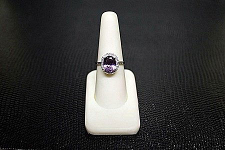 Very Fancy White Gold over Silver "Oval" Shape: Very Fancy White Gold over Silver "Oval" Shape Amethyst & Diamond Ring. Amethyst approx 3 cts, & Diamonds approx .15 ct VS1 Color G.