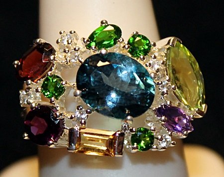 Fancy Multi colored Sterling Silver Ring.: Fancy Multi colored Sterling Silver Ring. London Blue Topaz, Russian Chrome Diopside, Garnet with Diamonds twt approx. 7.5cts.