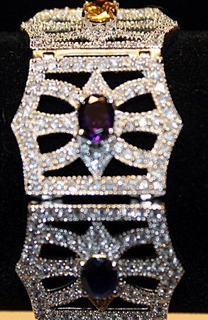 Beautiful Multi Colored Gemstones SS Bracelet.: Beautiful Multi Colored Gemstones SS Bracelet. Sterling Silver, Garnets, Topaz, Sapphires and Citrines twt approx. 20cts.