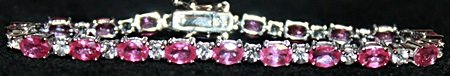 Gorgeous Pigeon Blood Rubies with White Topaz Sterling: Gorgeous Pigeon Blood Rubies with White Topaz Sterling Silver Bracelet. Natural Gemstones twt approx. 20cts.