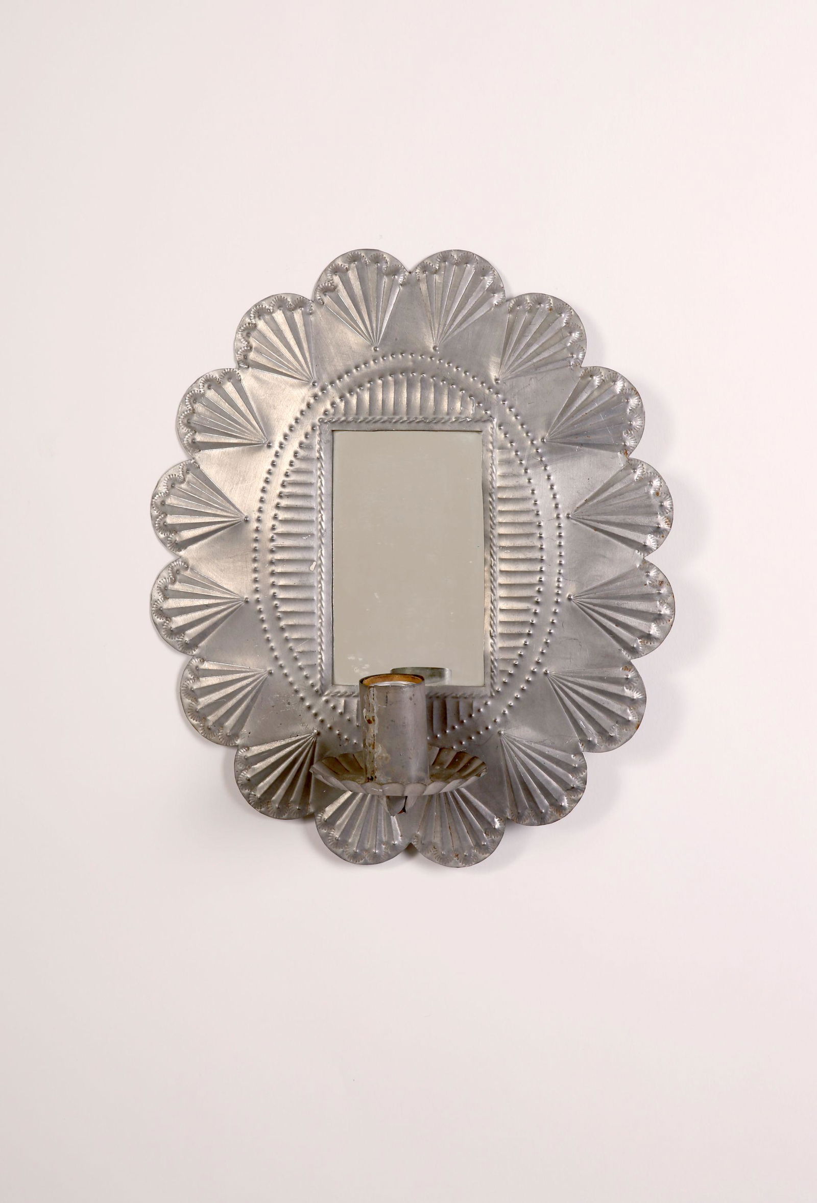 Round Tin Sconce with Mirror, ca. 1950: New Mexico, Revival Attributed to Robert Woodman Round Tin Sconce with Mirror ca. 1950 5 1/4 x 3 1/4 in. (the mirror) 12 x 10 x 4 in.
