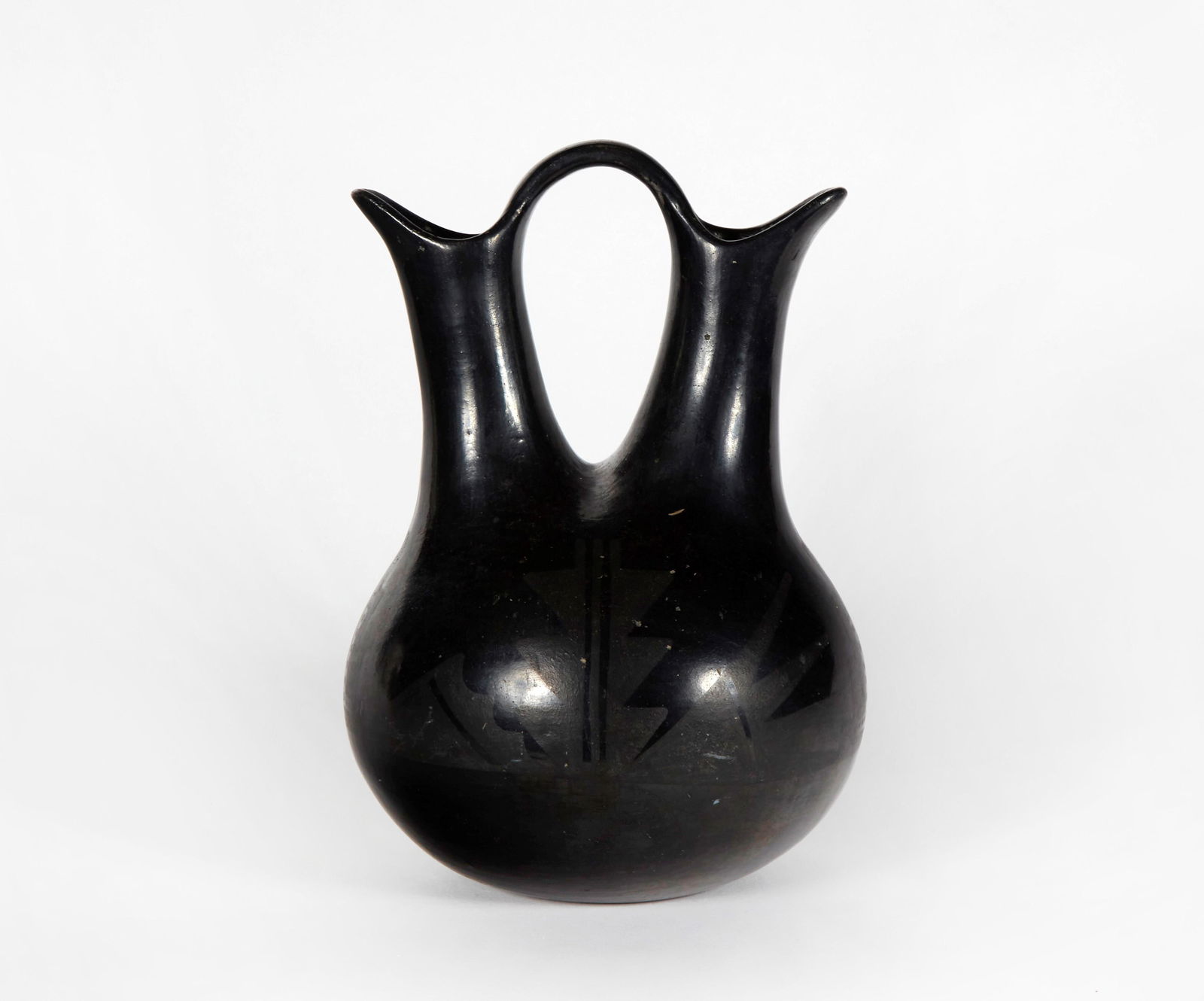 San Ildefonso, Maria Martinez, Blackware Wedding Vase: Maria Martinez(San Ildefonso, 1887 - 1980)Blackware Wedding Vasesigned underside: Marieheight 9 1/2 x diameter 7 in