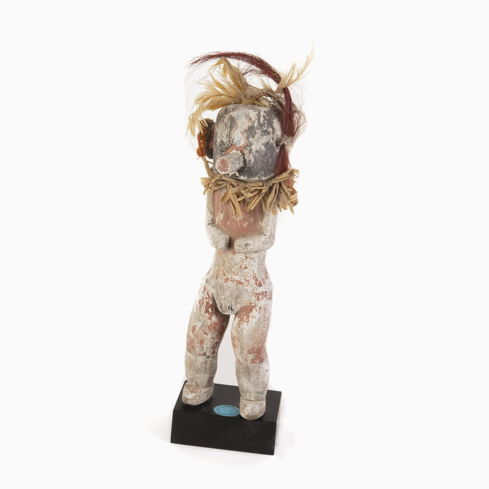 A Hopi Corn Dancer Kachina, ca. 1920-1940: Hopi Sio Avachhoya [Corn Dancer] Kachina, ca. 1920-1940 12 x 2 3/4 x 2 in. (30.48 x 6.99 x 5.08 cm.), With Stand: 13 1/2 x 3 1/2 x 2 3/4 in. (34.29 x 8.89 x 6.99 cm.) The Collection of Don Redlich