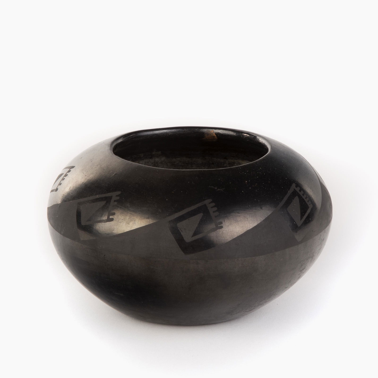 San Ildefonso, Maria Martinez, Blackware Bowl: Maria Martinez(San Ildefonso, 1887 - 1980)Blackware Bowlfired clayinscribed underside: Marieheight 3 5/8 x diameter 6 1/4 in. (9.21 x 15.88 cm.)