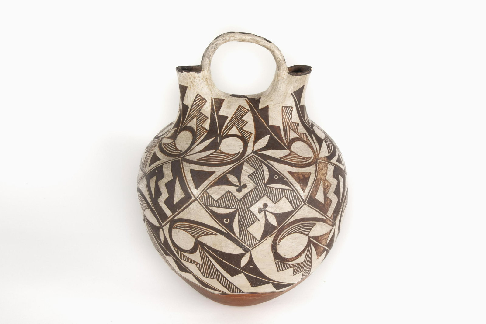 An Acoma Black on White Wedding Jar, ca. 1910: Acoma Black on White Wedding Jar, ca. 1910 fired clay, pigment height 14 3/4 x diameter 11 in. (37.47 x 27.94 cm.) Private Collection, New Mexico
