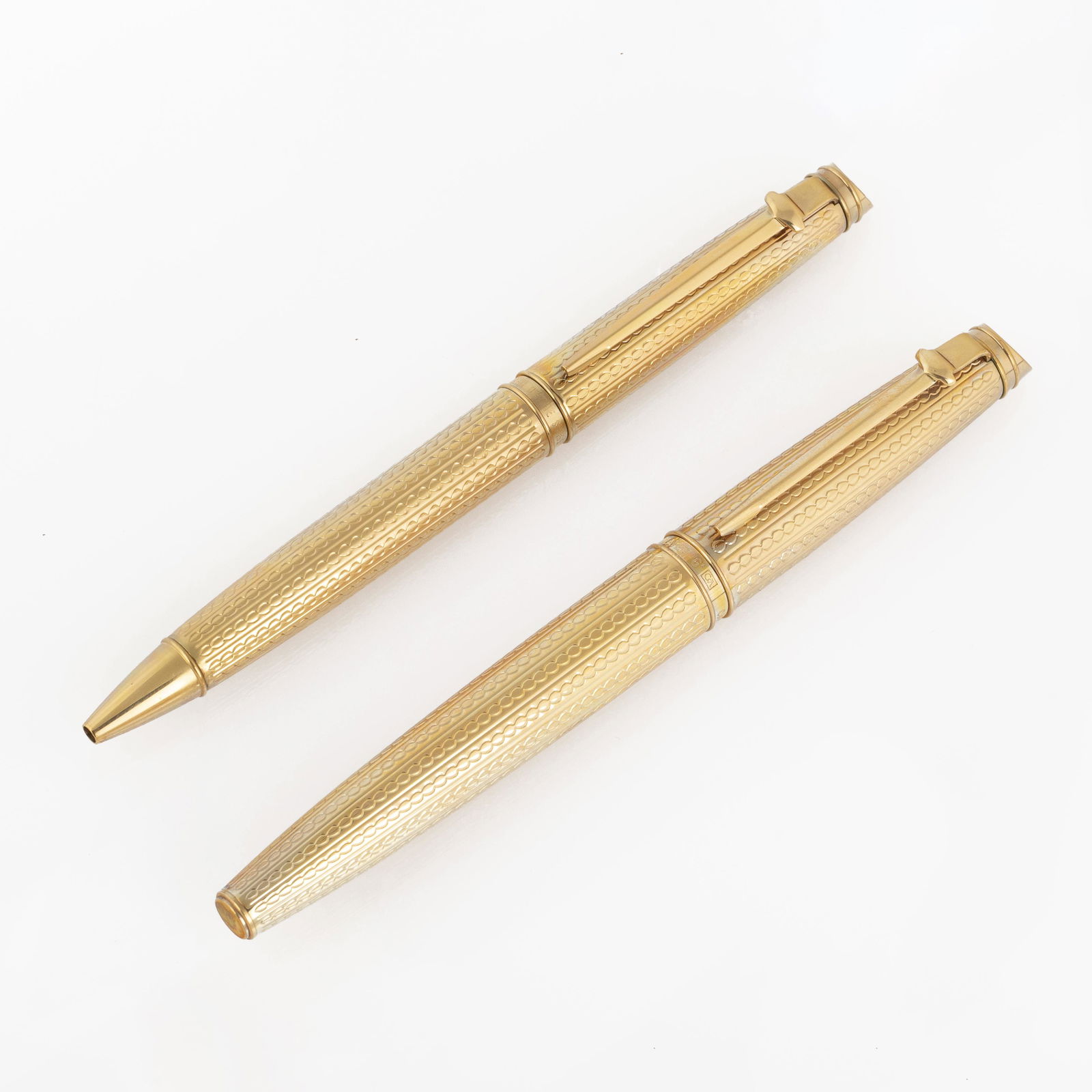 A Pair of Limited Edition Caran d'Ache Gold Plated Pens (1 of 3)
