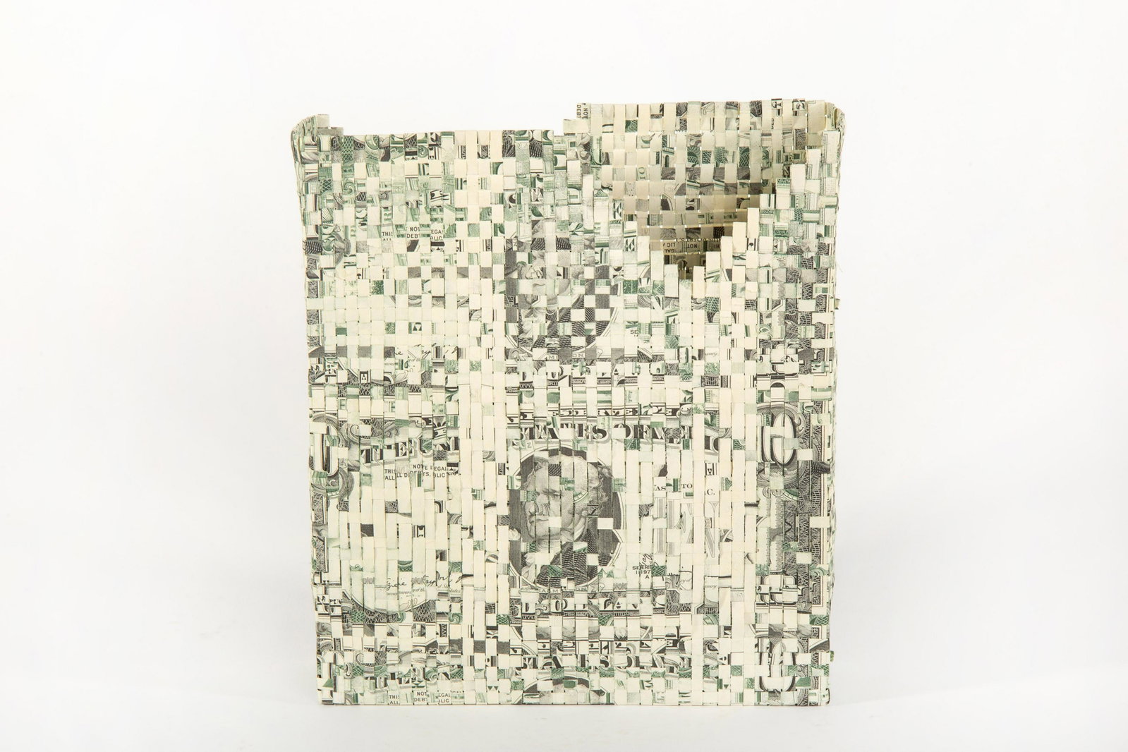 Zoe Morrow, Reconstructed Hamilton, 1988: Zoe Morrow (b. 1955) Reconstructed Hamilton, 1988 woven shredded currency inscribed: ZOE MORROW 1988 6 5/8 x 5 5/8 x 1 5/8 in. (16.83 x 14.29 x 4.13 cm.) The Barbara and Ed Okun Collection