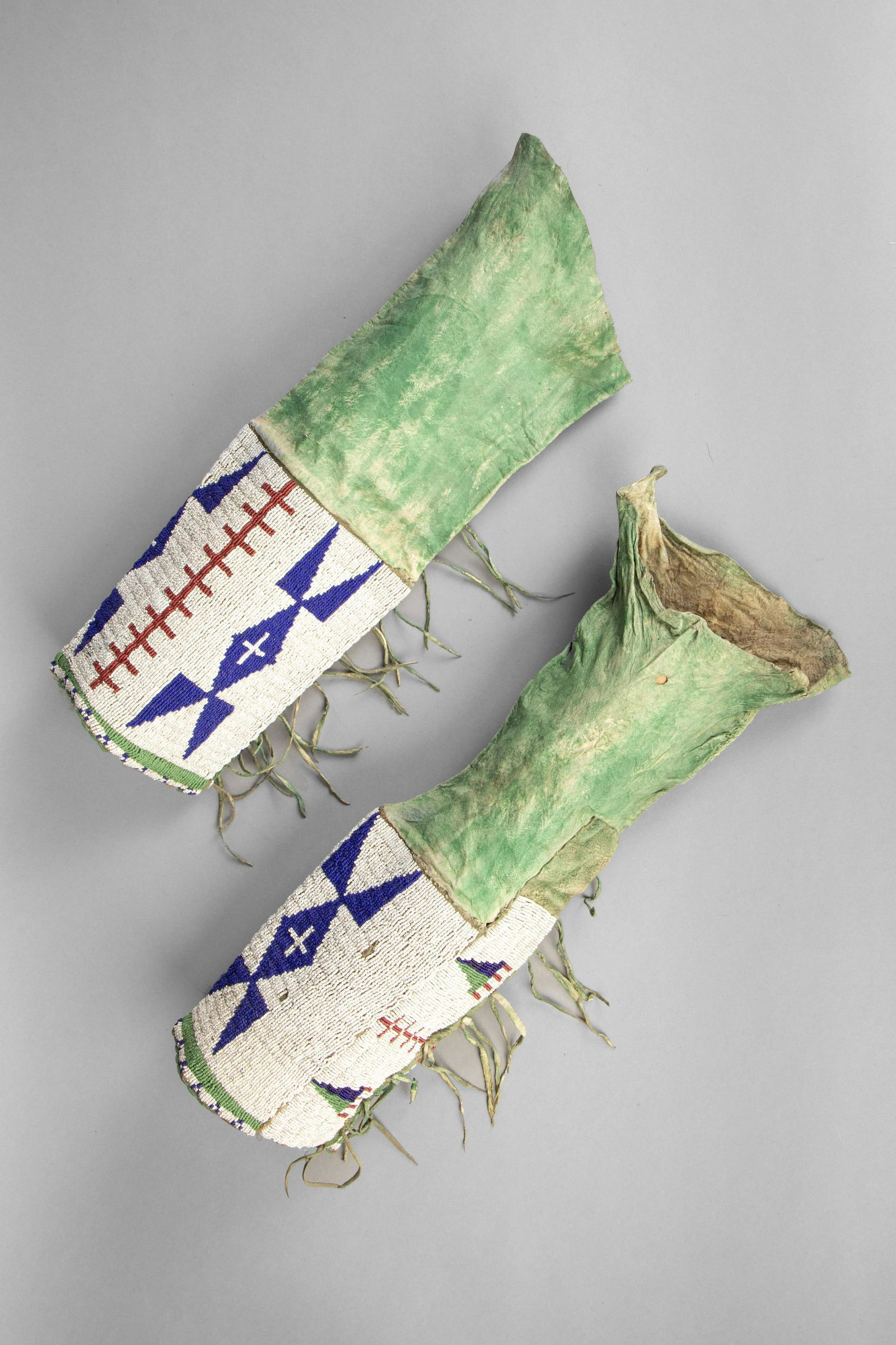 Plains, Pair of Beaded and Ochred Hide Leggings, ca. (1 of 2)