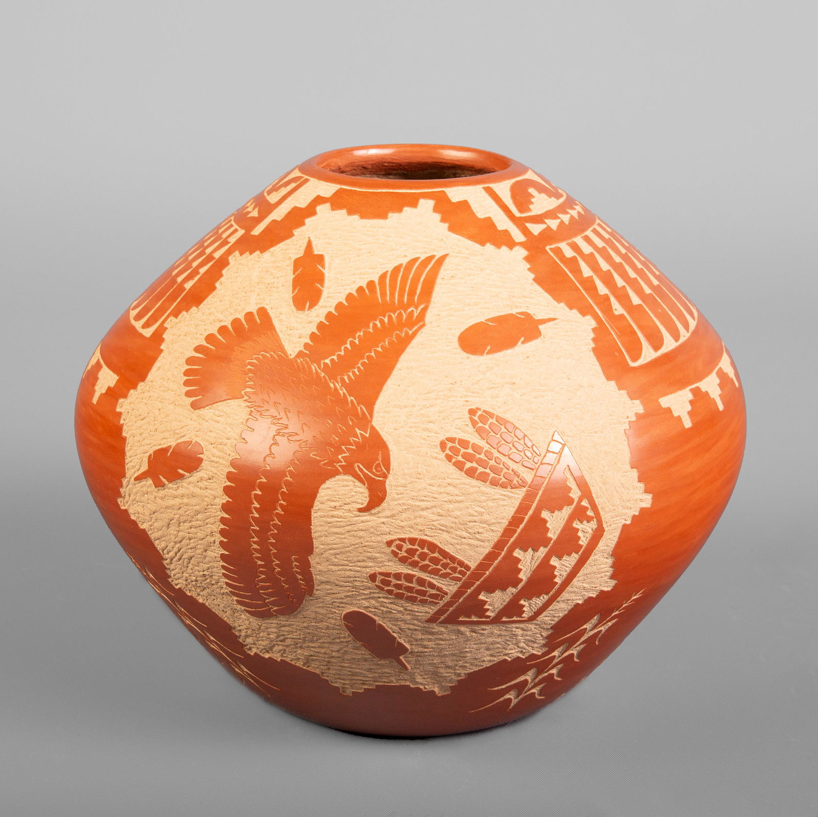 Jemez, Alvina Yepa, Redware Eagle and Feather Seed Jar: Alvina Yepa(Jemez, b. 1954)Redware Eagle and Feather Seed Jarfired clayinscribed underside: Alvina Yepa / Jemez Pueblo, / NMheight 5 3/4 x diameter 6 3/4 in. (14.61 x 17.15 cm.) Private Collection, Ne