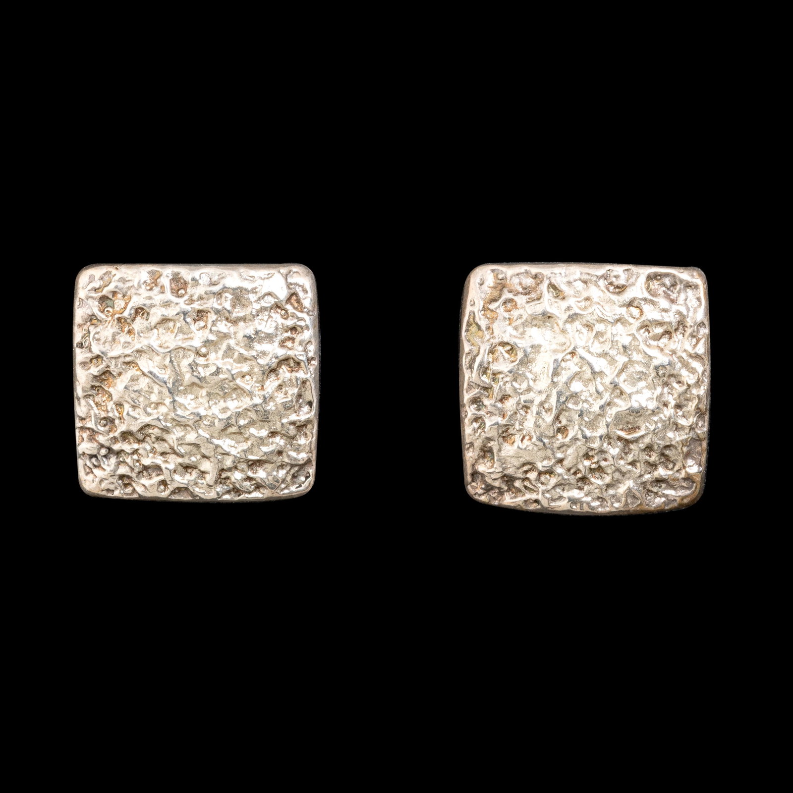 Charles Loloma, Pair of Tufa Cast Silver Earrings (1 of 2)