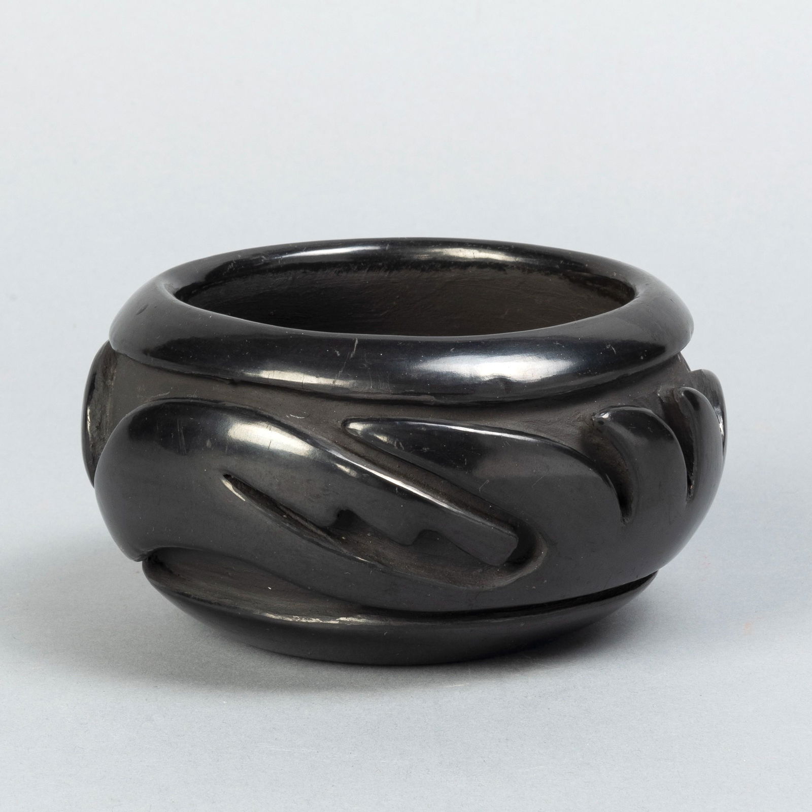 Teresita Naranjo, Santa Clara Bowl: Teresita Naranjo(Santa Clara, 1919 - 1999)Santa Clara Bowlcarved blackwareinscribed underside: Teresita / Naranjo / Santa Clara / Puebloheight 2 1/2 x diameter 4 1/2 in. (6.35 x 11.43 cm.) Private Col