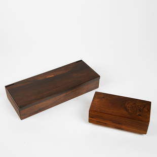 After Richard Rothbard, A Pair of Handcrafted Rosewood Boxes: After Richard Rothbard(b. 1940)A Pair of Handcrafted Rosewood Boxesrosewood, fabricWooden Box: 2 1/2 x 6 7/8 x 3 1/2 in. (6.35 x 17.46 x 8.89 cm.), Wooden Box with Sunset Inlay: 2 1/4 x 11 3/4 x 4 7/8