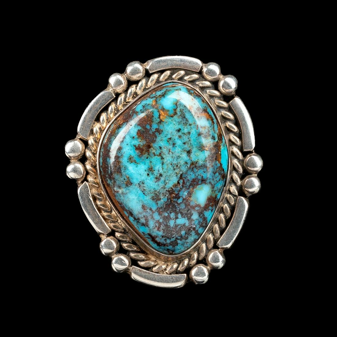 Julian Lovato, Turquoise Ring: Julian Lovato(Kewa [Santo Domingo], 1925 - 2018)Turquoise Ringturquoise, silvermarked: J.Lovato, IHM / sterlingengraved: AZ3APapproximate ring size: 6.25overall weight: 18.2 grams1 3/8 x 1