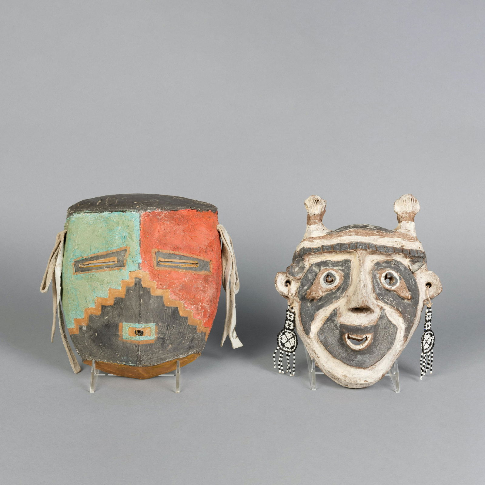 Agnes Sims, Pair of Katsinam Masks: Agnes Sims(1910 - 1990)Pair of Katsinam Masksfired clay, wood, leather, pigments, glass seed beadseach inscribed verso: Anges SimsLeft: 9 x 7 1/2 x 1 1/4 in. (22.86 x 19.05 x 3.18 cm.), Right: 8 1/2 x