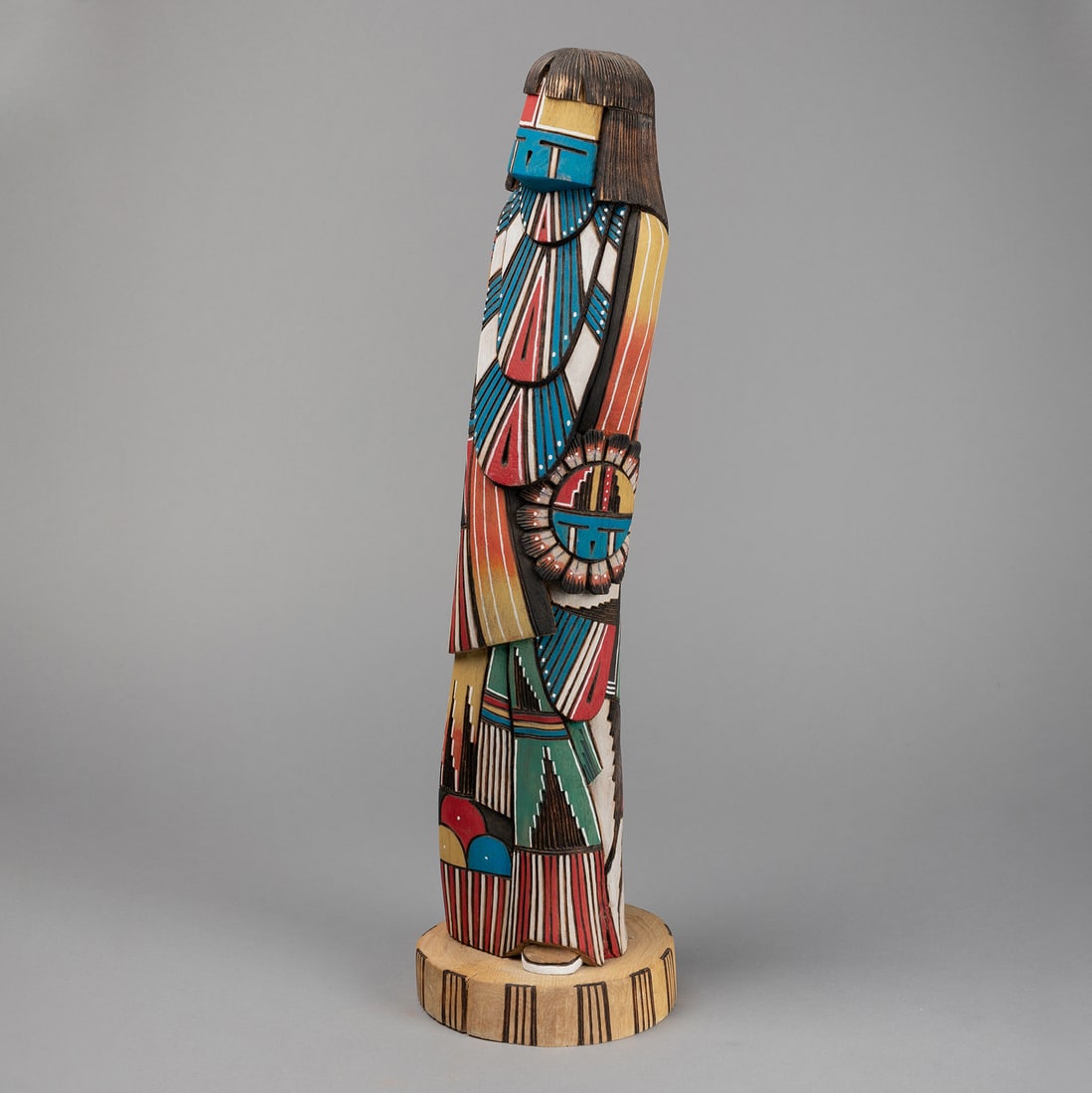 B. Byron, Sunface Katsina: B. Byron (Hopi, 20th Century) Sunface Katsina carved cottonwood, pigments inscribed: Sunface / Byron 21 x 5 3/4 x 6 in. (53.3 x 14.6 x 15.2 cm.) Private Collection, New Mexico