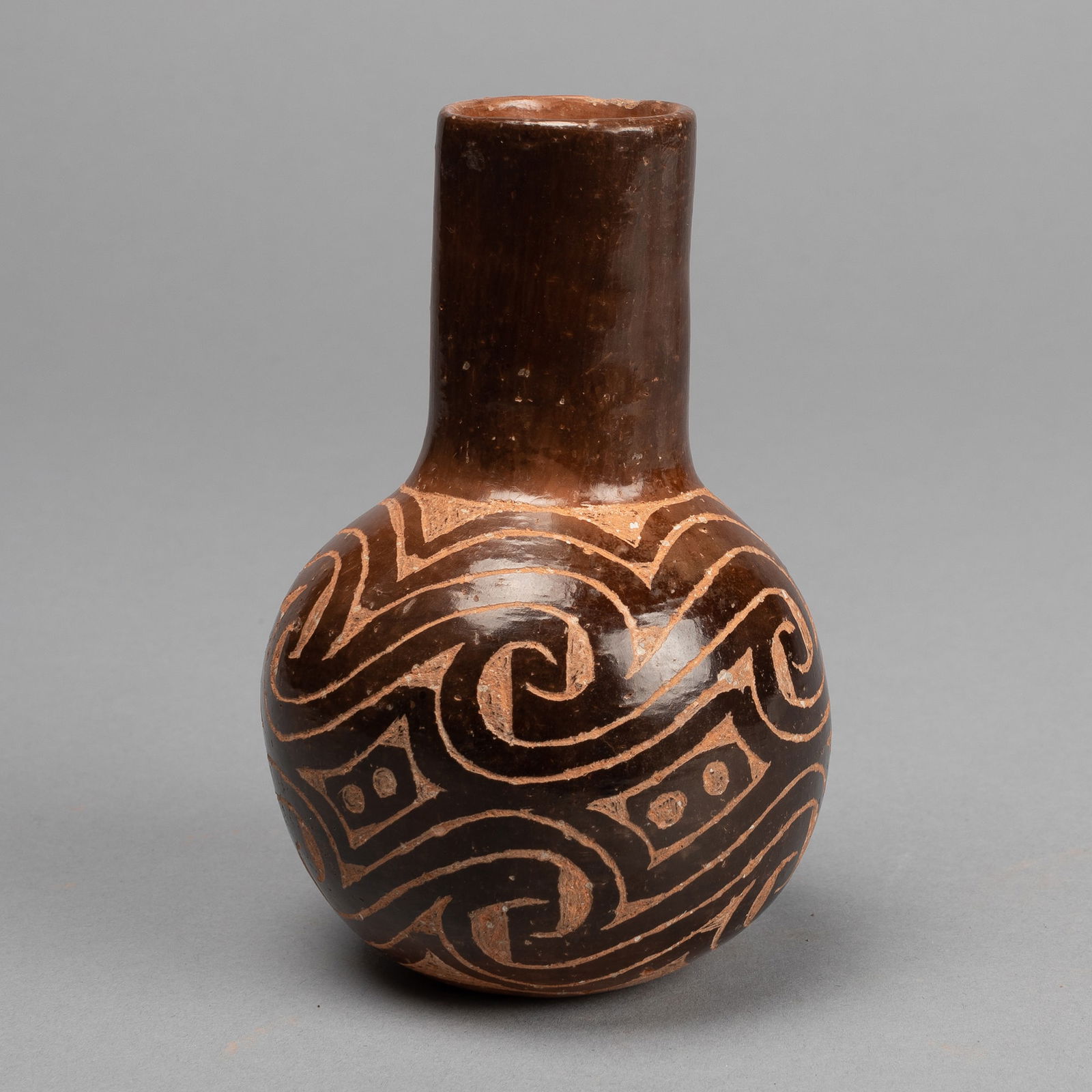 Chase Kahwinhut Earles, Small Brown Bottle (1 of 1)