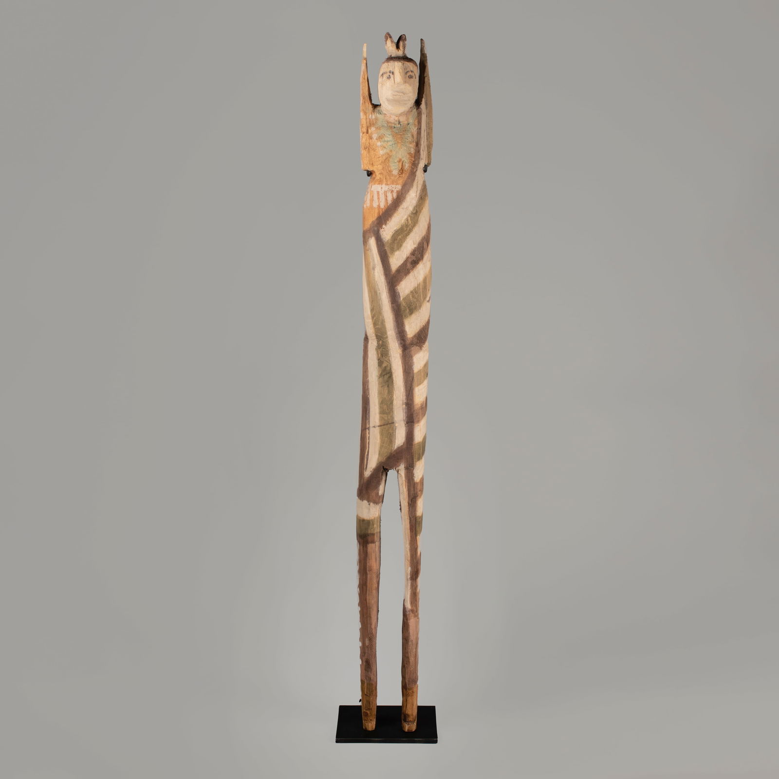 Charlie Willeto, Tall Figure: Charlie Willeto(1897 - 1964)Tall Figurecarved wood, natural pigments49 3/8 x 5 1/4 x 4 3/4 in. (125.4 x 13.3 x 12.1 cm.), With base: 49 5/8 x 7 3/8 x 6 in. (126 x 18.7 x 15.2 cm.) Private Collection,