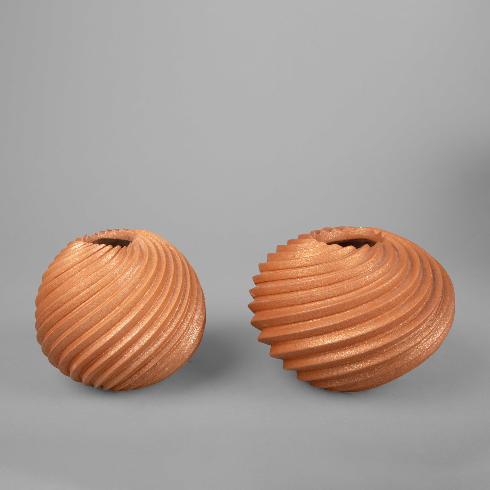 Dominique Toya, Pair of Micaceous Swirl Pots (1 of 2)
