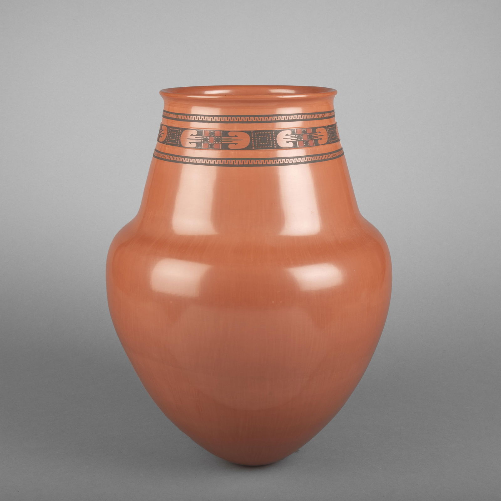 Octavio [Tavo] Silveira + Mirna Hernandez, Redware Pottery Jar: Octavio [Tavo] Silveira + Mirna HernandezMata Ortiz, (20th/21st Century)Redware Pottery Jarfired clayinscribed: TAVO / SILVEIRA / MIRNA HERNANDEZheight: 15 1/2 in. (39.4 cm.), diameter: 11 1/4 in. (28