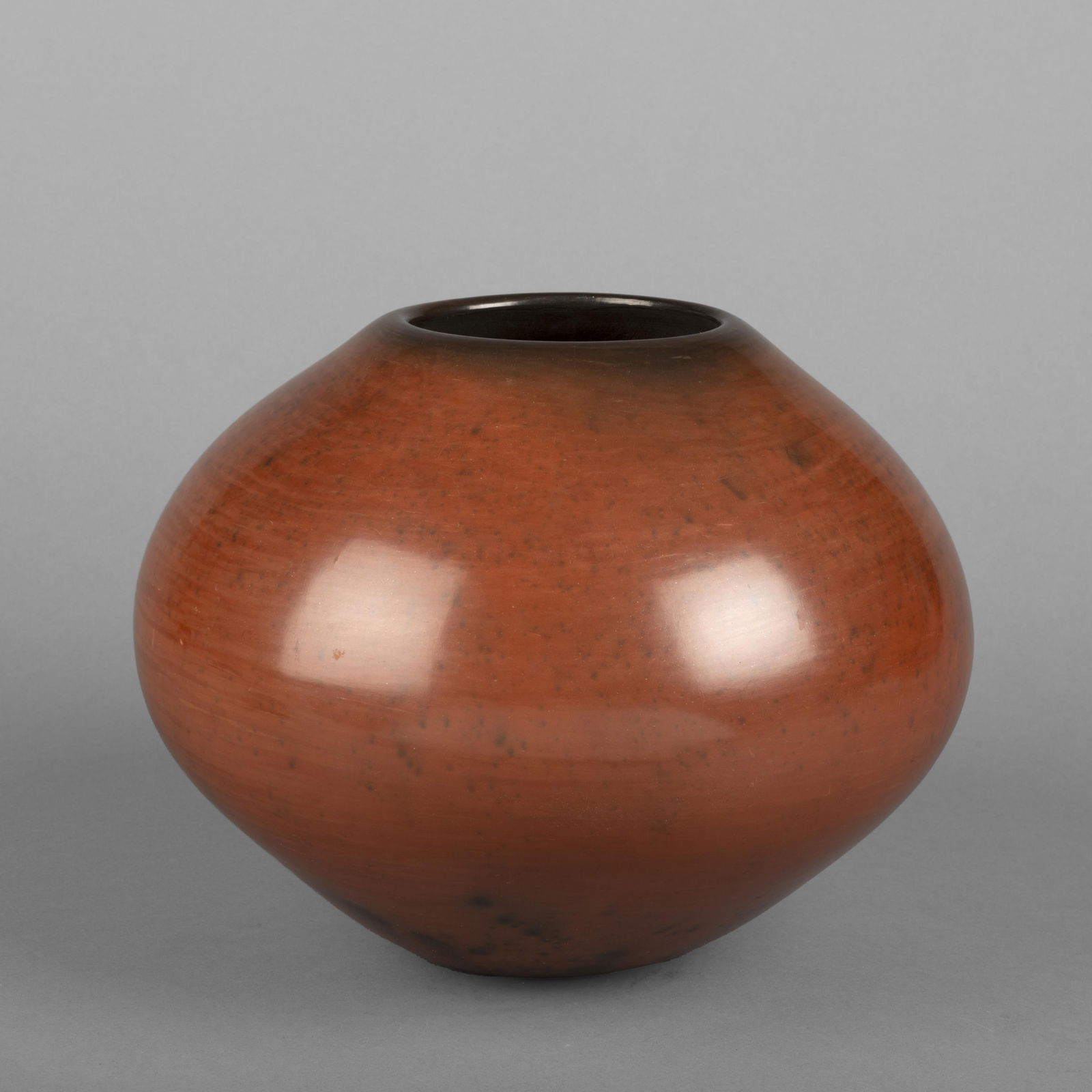 Jody Naranjo, Polished Redware Vase, ca. 1975: Jody NaranjoSanta Clara, (b. 1969)Polished Redware Vase, ca. 1975fired clayinscribed: JODYheight: 7 1/4 in. (18.4 cm.), diameter: 9 1/4 in. (23.5 cm.) The Larry Martine Collection, Santa Fe, New Mexic