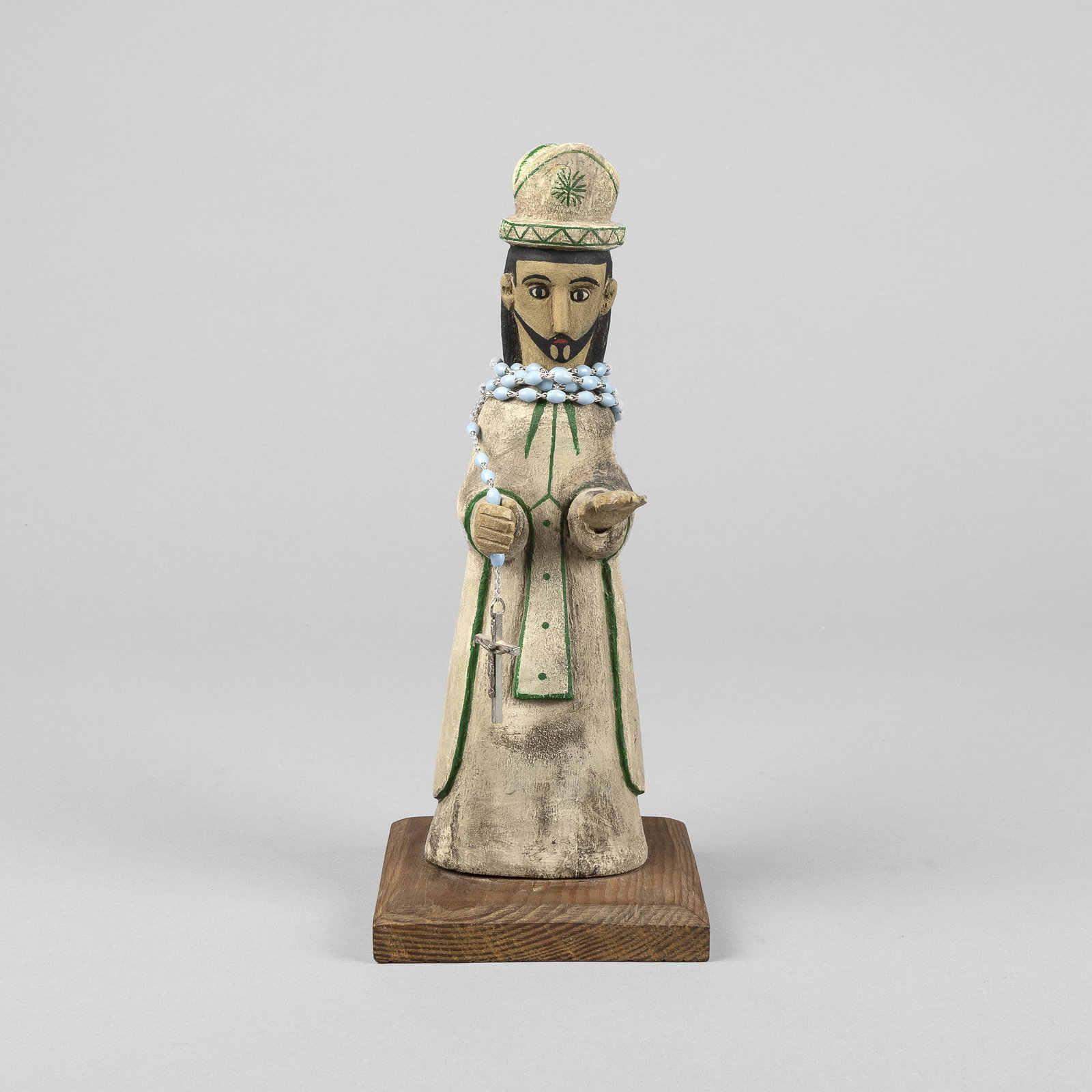 Frank Brito, San Patricio: Frank Brito1922 - 2005San Patriciocarved and painted cottonwood, rosary, wood baseinscribed underside base: FRANK BRITO11 1/4 x 4 5/8 x 4 1/2 in. (28.6 x 11.7 x 11.4 cm.) The Larry Martine Colle