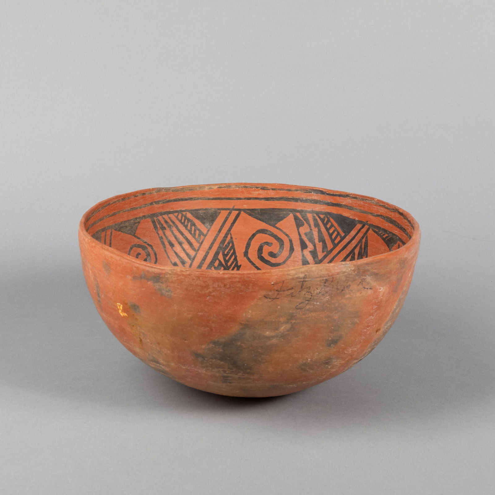 Ancestral Pueblo, Redware Bowl, ca. 1200 - 1250: Ancestral PuebloRedware Bowl, ca. 1200 - 1250fired clay, pigmentspossibly Fort Wingate5 1/2 x 11 3/4 in. (14 x 29.8 cm.) Collection of Hugh Zimmer, gift in 2017This work is part of the Ralph T. Coe fo