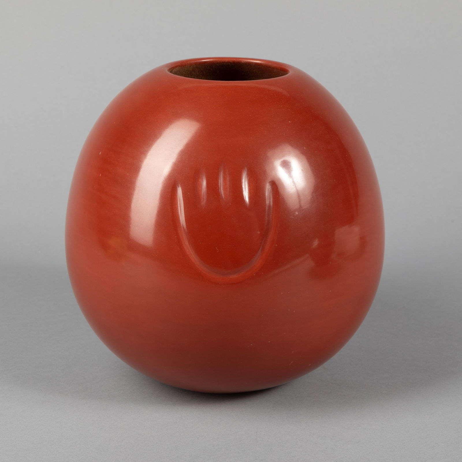 Tina Garcia, Redware Jar with Bear Paw Design: Tina GarciaOhkay Owingeh (San Juan) / Santa Clara, 1957 - 2005Redware Jar with Bear Paw Designfired clayinscribed: Tina Garcia / San Juan / Santa Clara 8 x 7 1/2 in. (20.3 x 19.1 cm.) Private C
