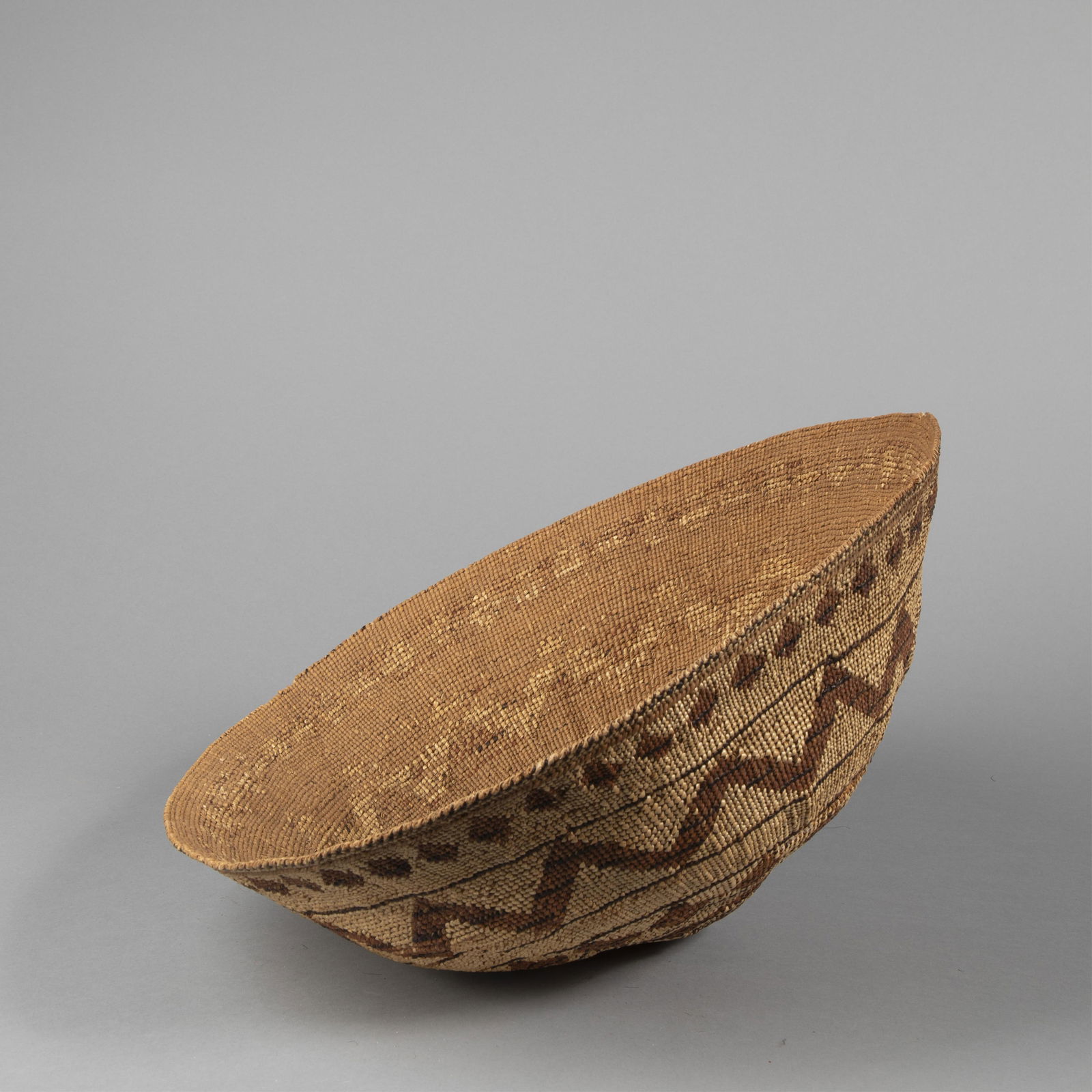 Yurok / Karok, Acorn Bowl, ca. 1820: Yurok / KarokAcorn Bowl, ca. 1820natural fibers7 1/2 x 17 in. (19.1 x 43.2 cm.) Private Collection, Wisconsin