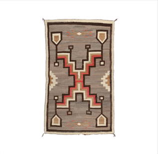 Diné (Navajo), Early Storm Pattern Rug, ca. 1915 - 1920: Diné (Navajo)Early Storm Pattern rug, ca. 1915 - 1920wool, natural and aniline dyesaccompanied with Certificate of Authenticity44 x 74 1/2 in. (111.8 x 189.2 cm.) Hubbell Trading Post, Ganado, Arizon