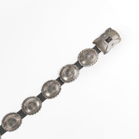H. D. Yazzie, Stamped Silver Concho Belt, ca. 1960
