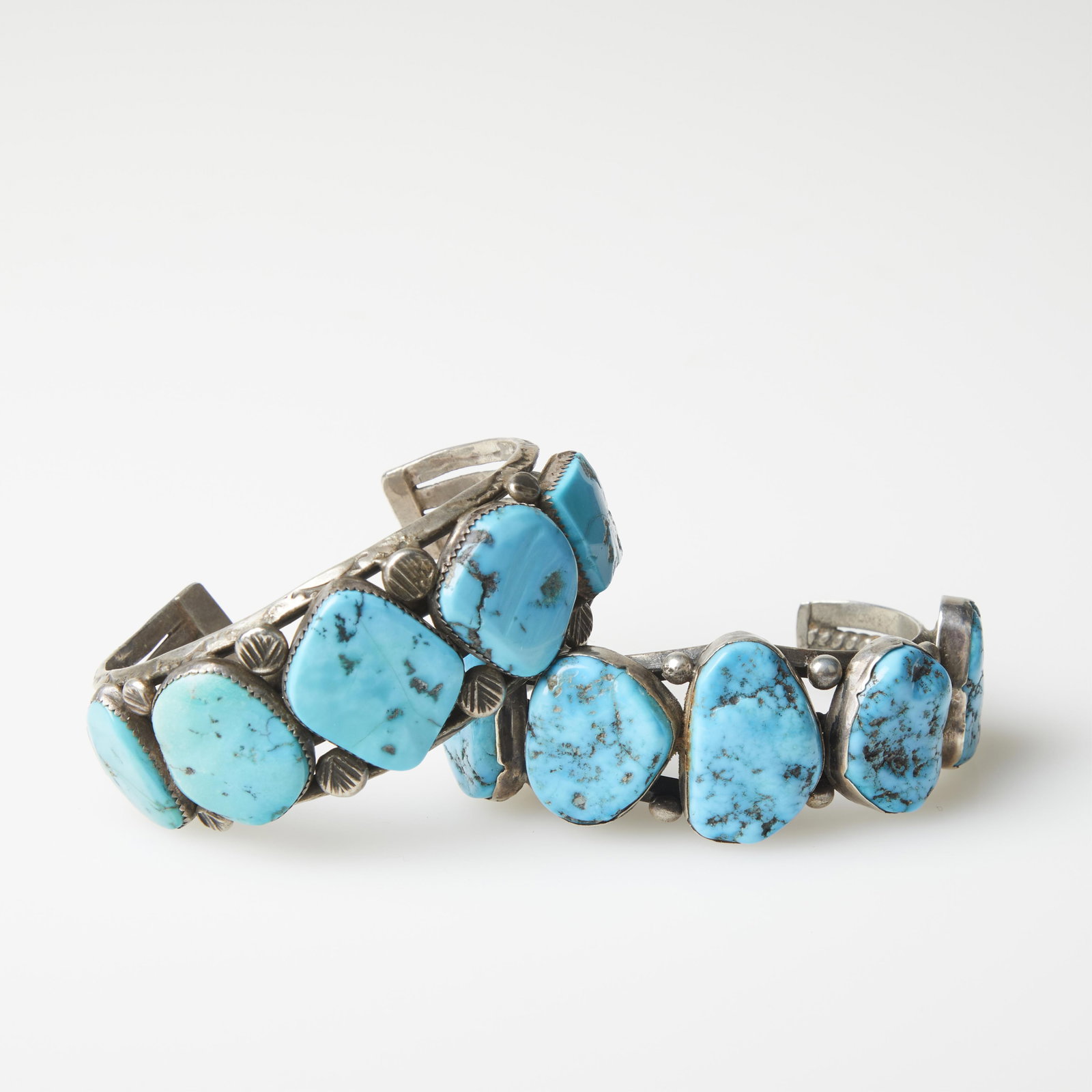 Diné (Navajo), Two Turquoise and Silver Cuff Bracelets, ca. 1965: Diné (Navajo)Two Turquoise and Silver Cuff Bracelets, ca. 1965silver, turquoise, Morenci turquoiseinternal circumference: 7 1/4 in. (18.4 cm.), gap: 1 1/8 in. (2.9 cm.), width: 1 1/4 in. (3.2 cm.), i