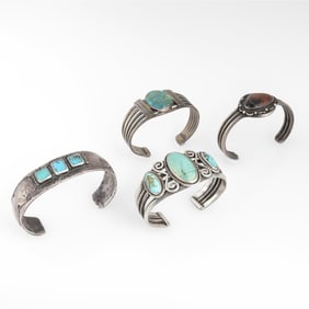 Attributed Diné (Navajo), Group of Four Silver Cuff Bracelets, ca. 1930 - 1960