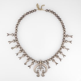 Attributed Diné (Navajo), Two Silver Squash Blossom Necklaces with Sandcast Najas, ca. 1950 - 1960