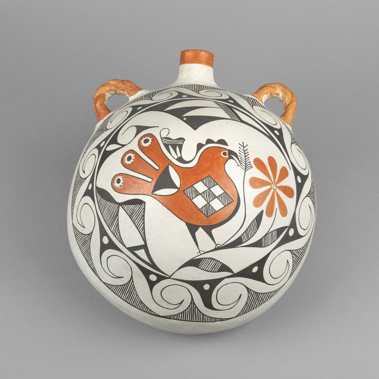 Eva Histia, Polychrome Canteen: Eva HistiaAcoma, 1914 - 2005Polychrome Canteenfired clayinscribed: E. Histia / Acoma / N. Mexicoheight: 8 3/4 x diameter: 12 x 11 1/4 in. (22.2 x 30.5 x 28.6 cm.) Private Collection, Colorado