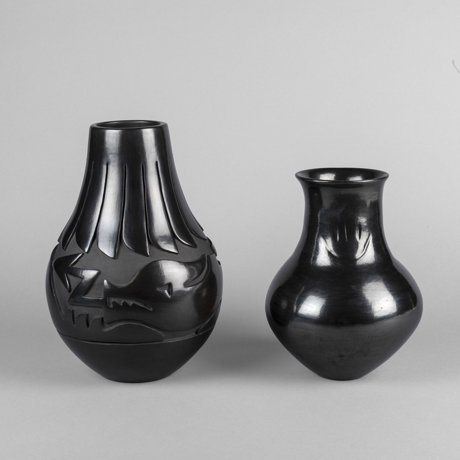 Mida Tafoya + Sharon Garcia, Two Blackware Vases with Carved Avanyu + Bear Paw Designs (1 of 3)