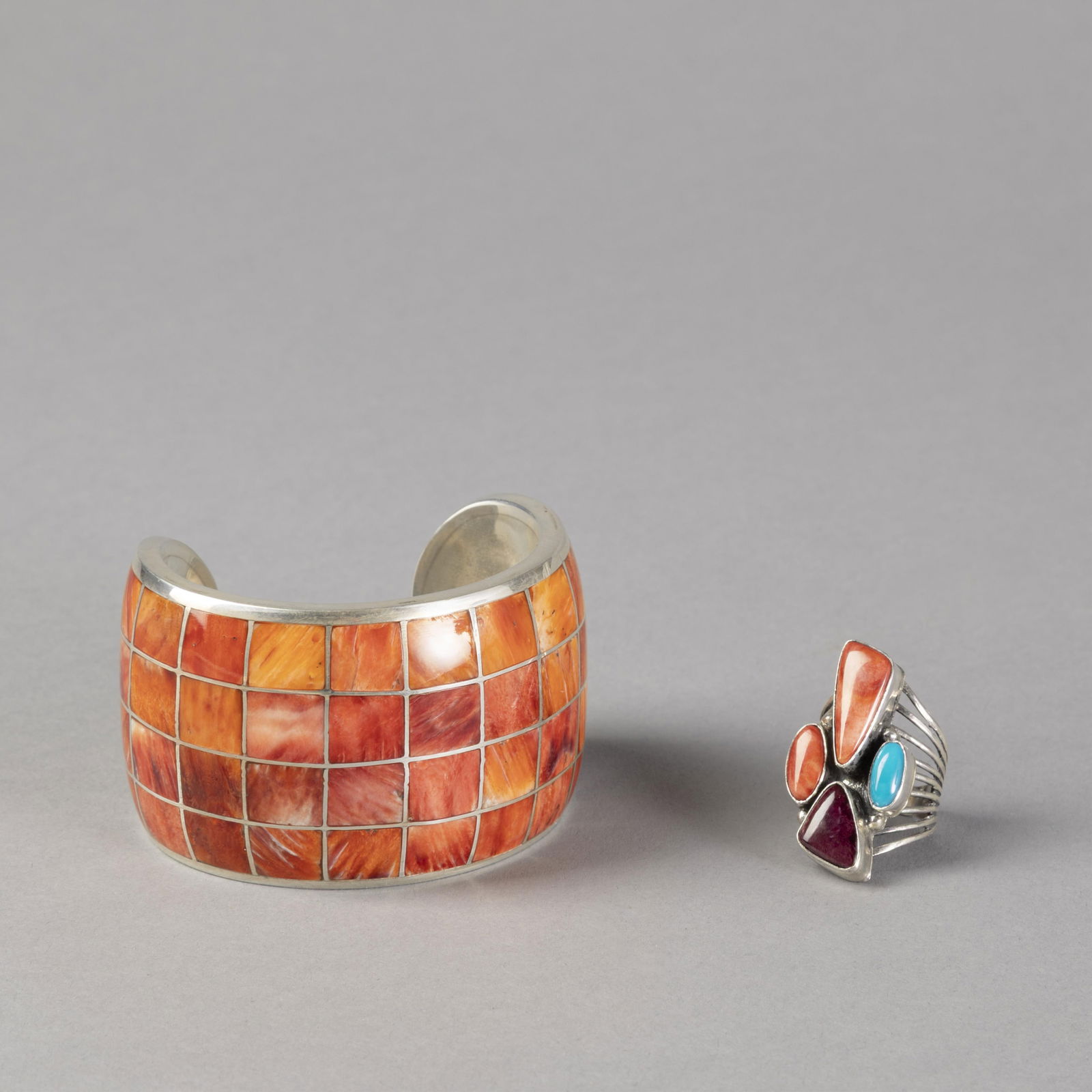 Federico Jimenez + Roie Jaque, Two Jewelry Items: Spiny Oyster Cuff and Multi-Stone Ring: Federico Jimenez + Roie JaqueMexican + Diné (Navajo), b. 1941 + 20th/21st CenturyTwo Jewelry Items: Spiny Oyster Cuff and Multi-Stone Ringsterling silver, spiny oyster, turquoise, purple spiny oyster