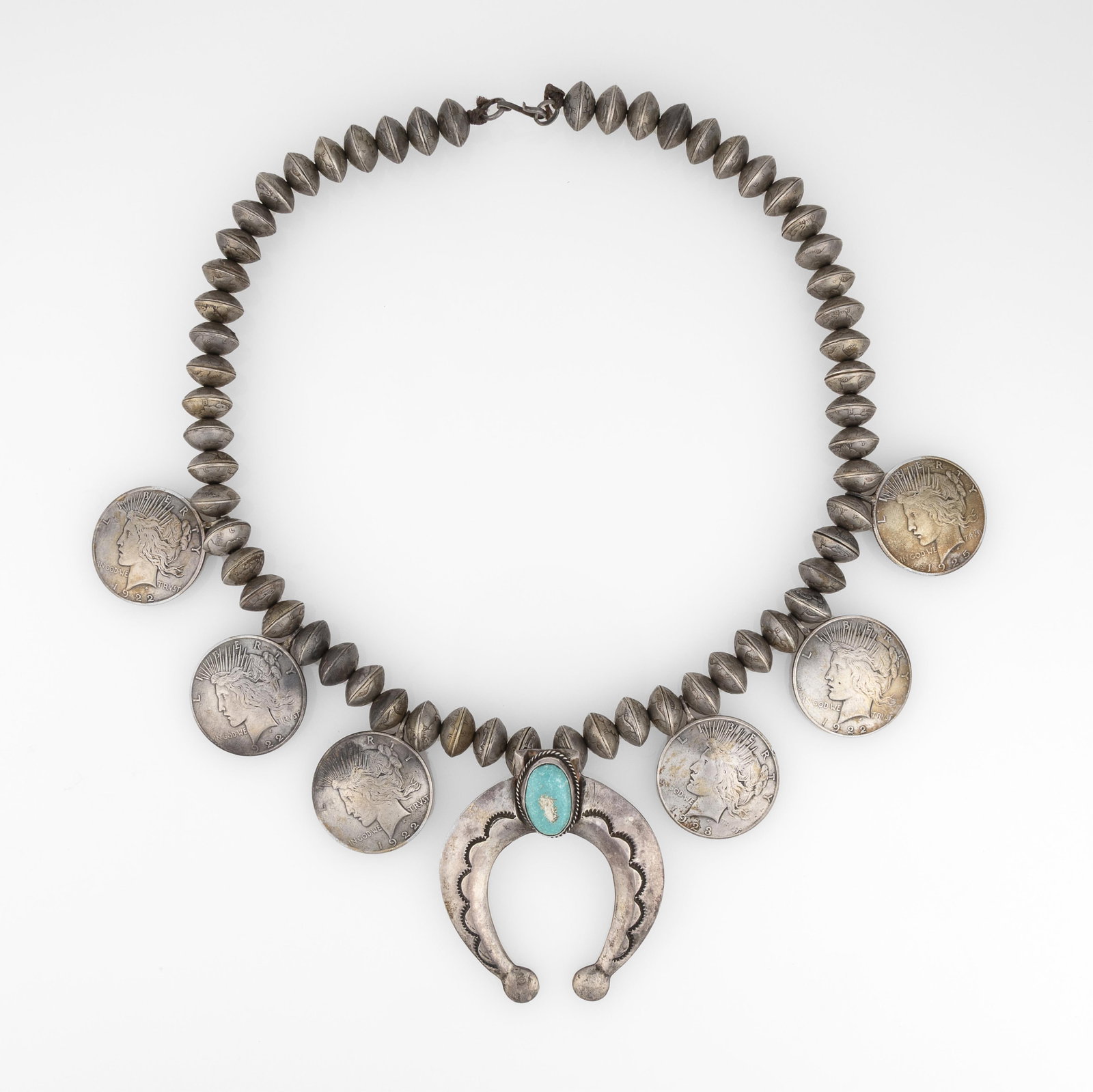 Attributed Diné (Navajo), Squash Blossom Coin Necklace with Turquoise Cabochon, ca. 1950 (1 of 2)