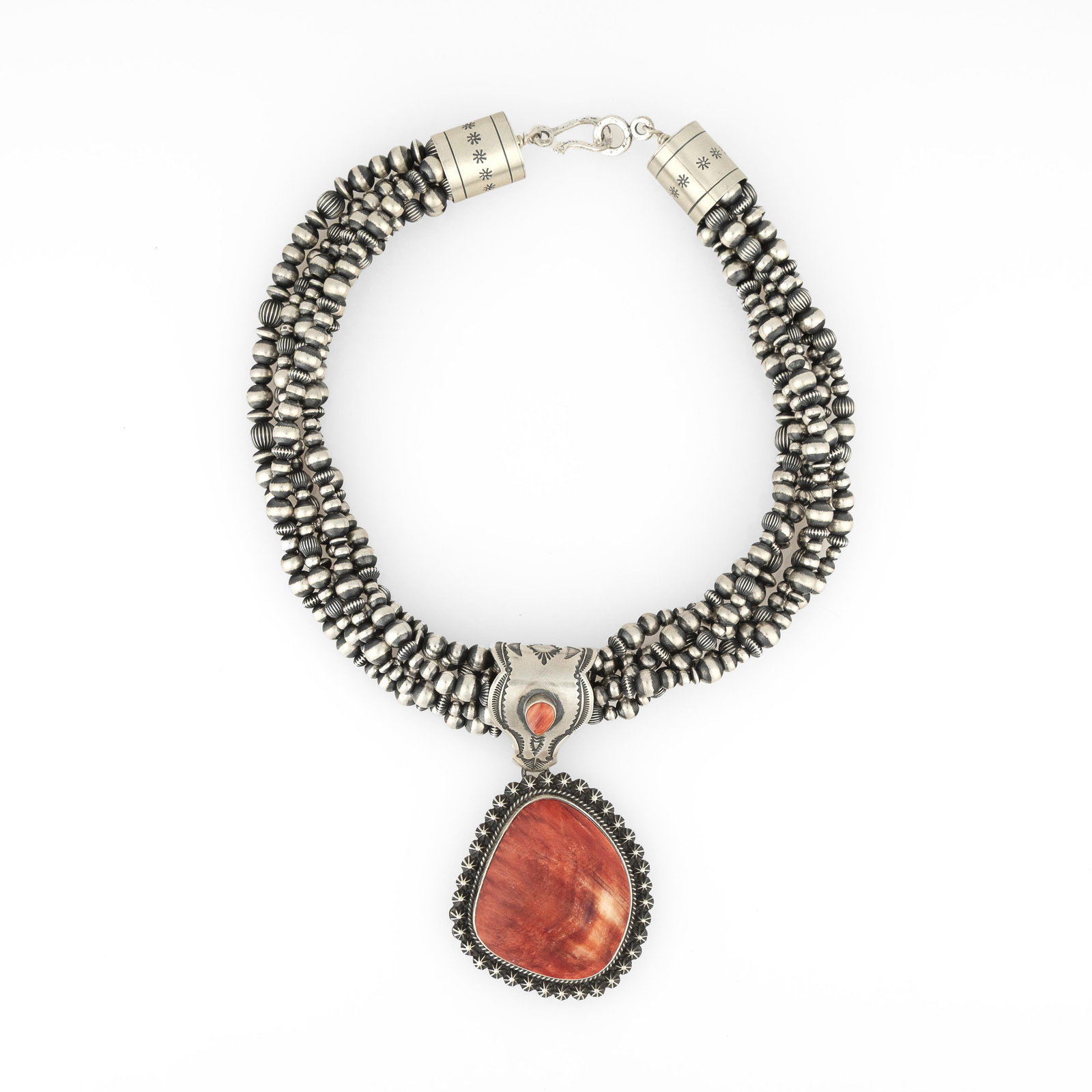 Rudy Willie, Silver Beaded Necklace with Spiny Oyster Pendant: Rudy WillieDine (Navajo), b. 1965Silver Beaded Necklace with Spiny Oyster Pendantsterling silver, spiny oysterstamps: Rudy Willie / STERLINGhanging length: 11 1/2 in. (29.2 cm.), pendant: 3 3/4 in. (9