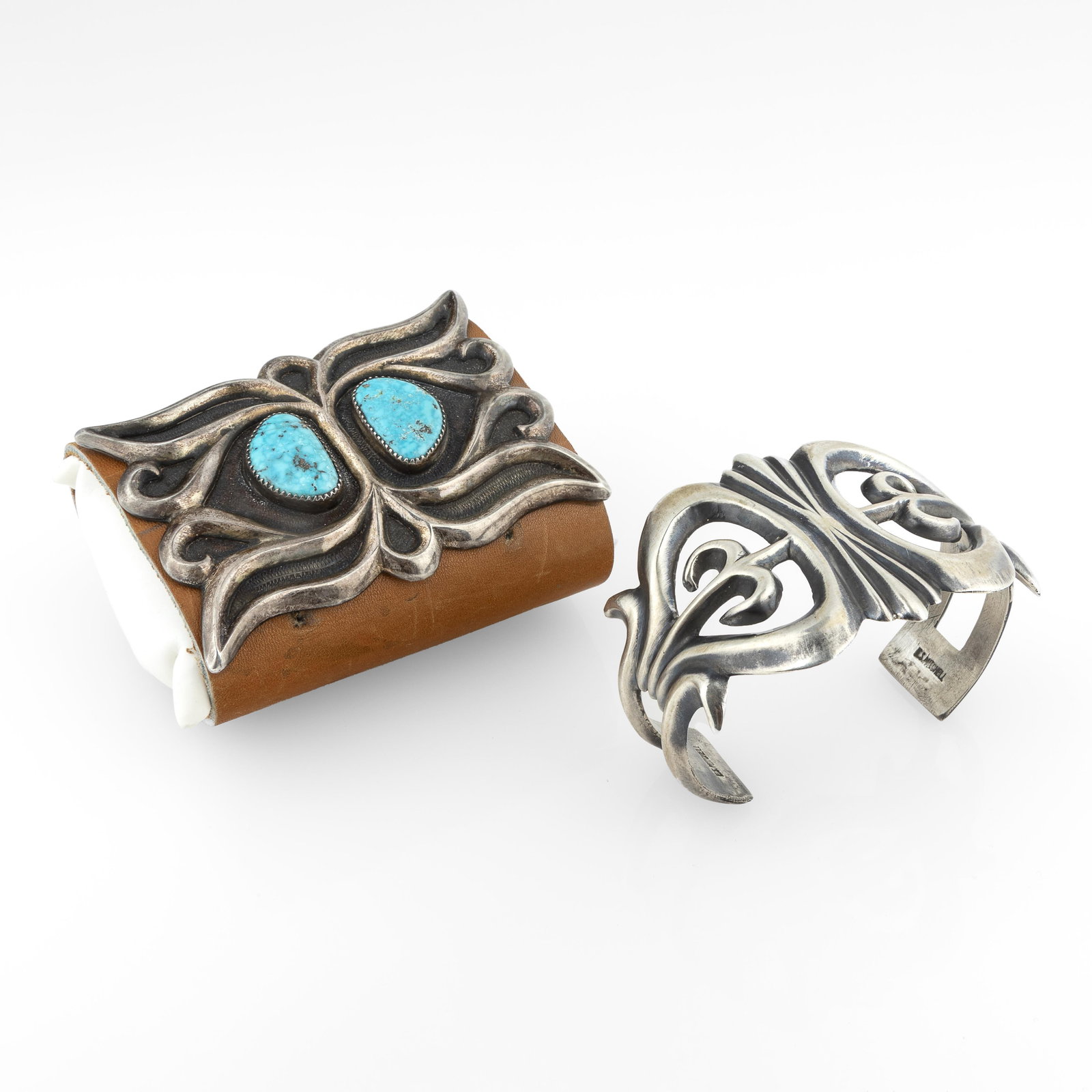 Eugene Mitchell et al, Sandcast Silver Jewelry Set with Cuff, ca. 1975 + Ketoh, ca. 1965: Eugene Mitchell et alDiné (Navajo), 20th/21st CenturySandcast Silver Jewelry Set with Cuff, ca. 1975 + Ketoh, ca. 1965sterling silver, turquoise, leatherEugene MitchellDiné (Navajo)Sandcast Silver C
