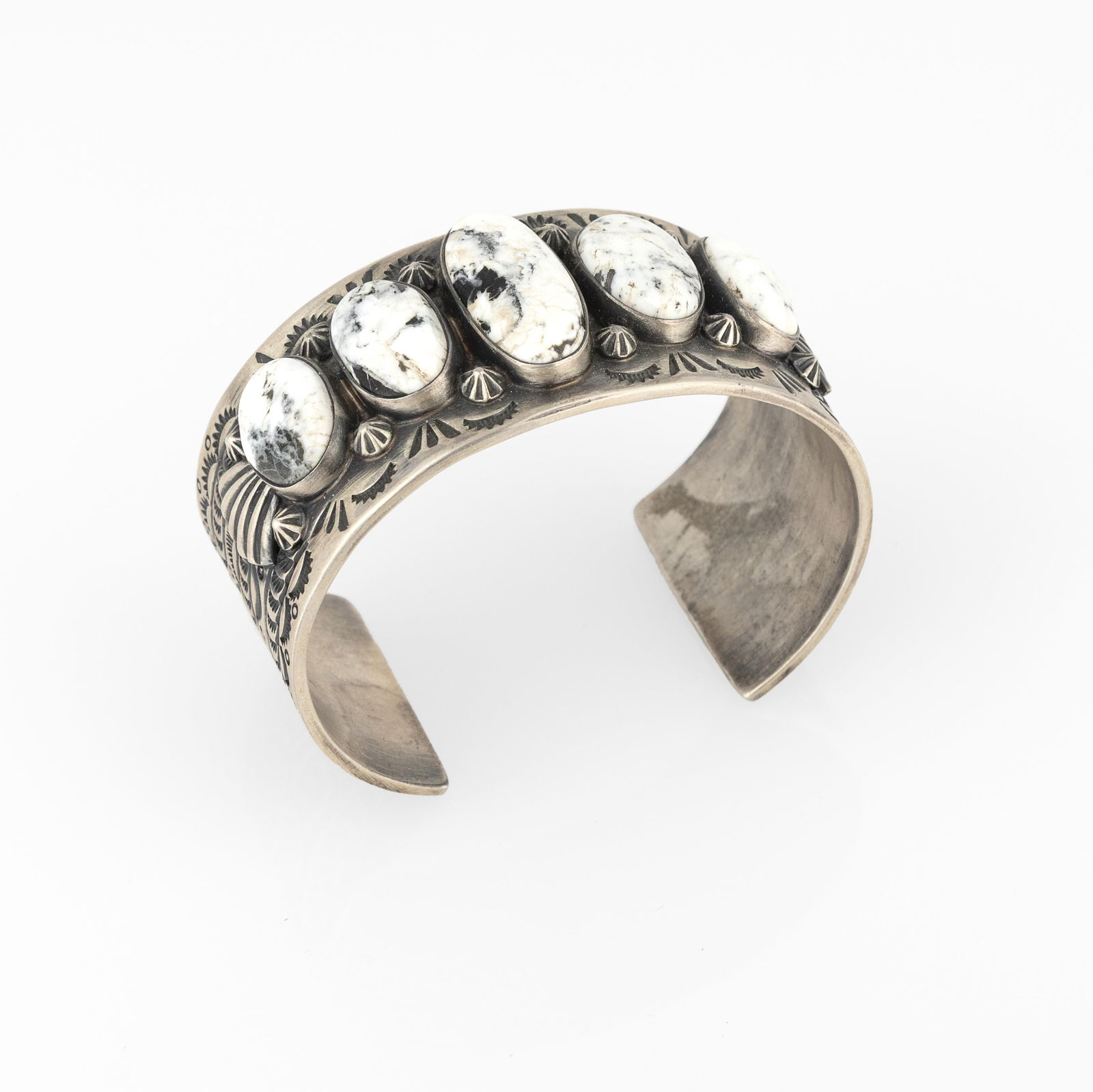 Mike Platero, Silver Cuff with Howlite Cabochons: Mike PlateroDiné (Navajo), 20th/21st CenturySilver Cuff with Howlite Cabochonssterling silver, howlitestamped: Sterling / MPinner circumference: 5 3/8 in. (13.7 cm.), gap: 1 1/4 in. (3.2 cm.), width: