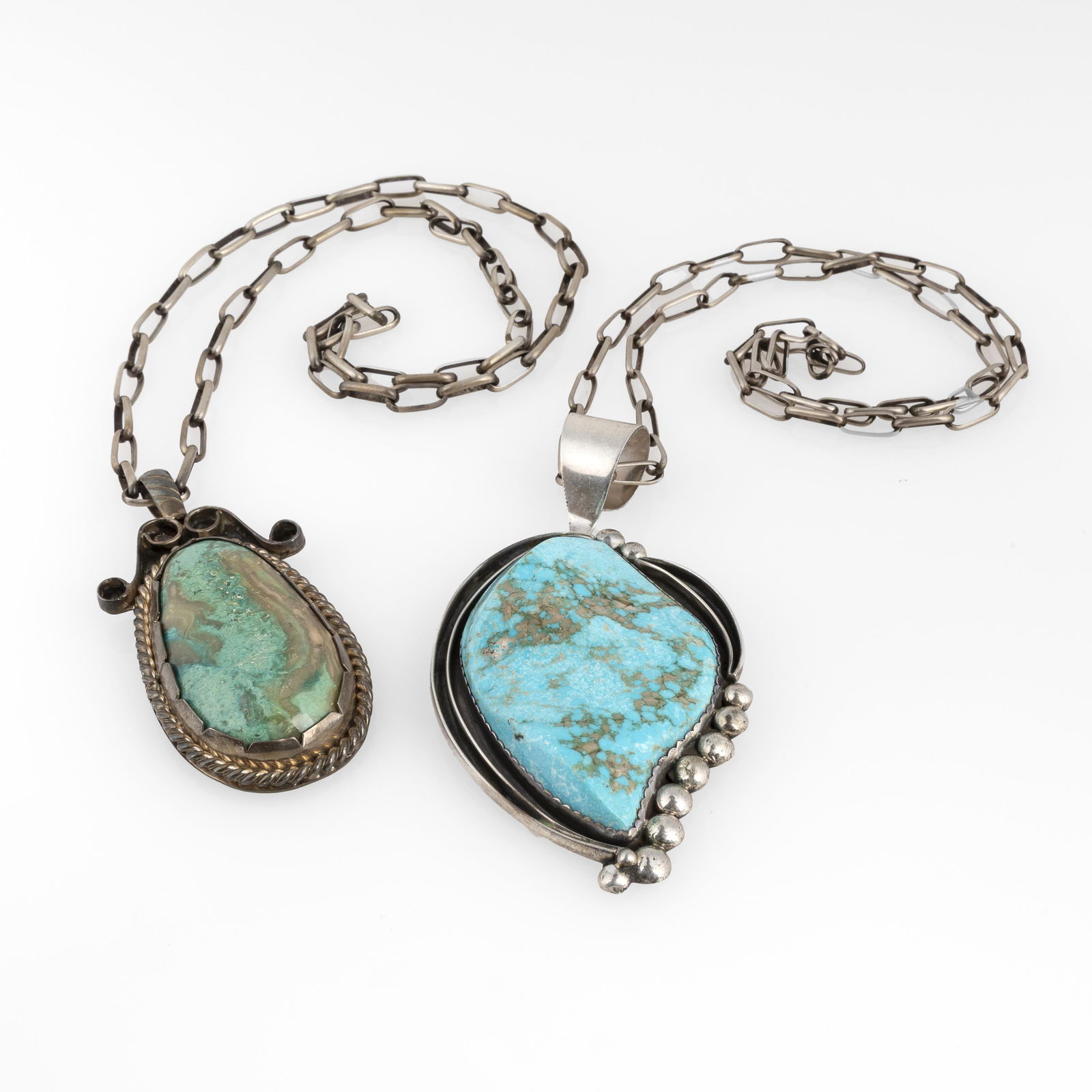 Attributed Diné (Navajo), Two Silver and Turquoise Pendants, ca. 1950 - 1960 (1 of 3)