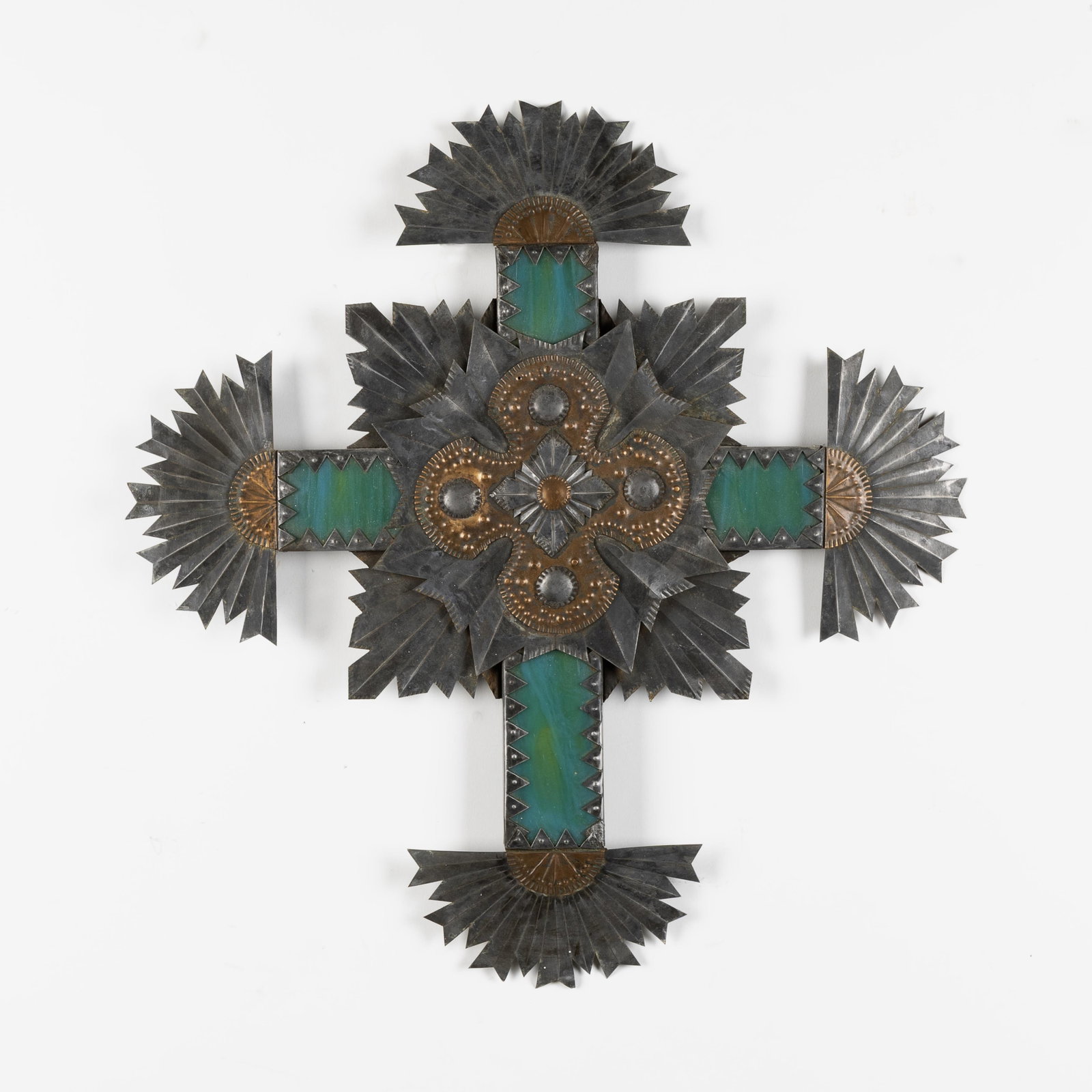 New Mexico, Stamped Tin Cross with Stained Glass Panels, ca. 2000: New Mexico Stamped Tin Cross with Stained Glass Panels, ca. 2000 stamped tin, copper, stained glass 18 1/2 x 17 3/8 x 3/4 in. (47 x 44.1 x 1.9 cm.) Private Collection, New Mexico